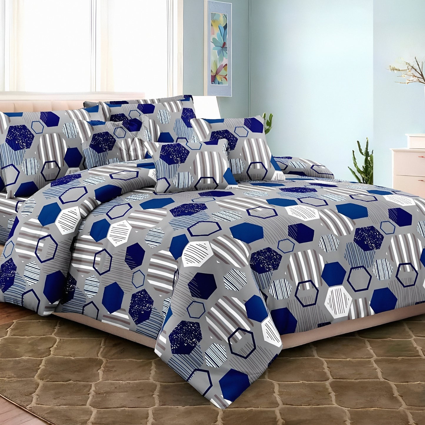 Modern blue and grey geometric printed cotton bedsheet on bed