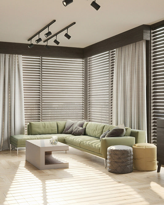 Modern living room interior with elegant roller blinds filtering natural sunlight through large windows