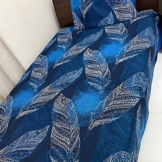 Transform your bedroom into a relaxing retreat with this luxurious Blue Leaf Bedsheet from Julanar Home Decor.
