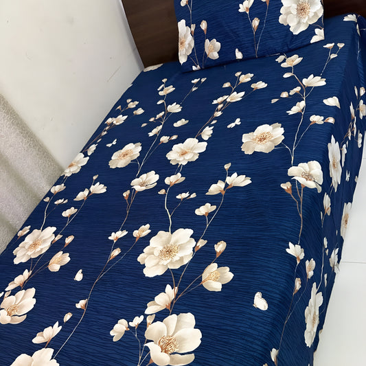 navy blue floral bedsheet featuring delicate white flowers and soft, durable fabric.