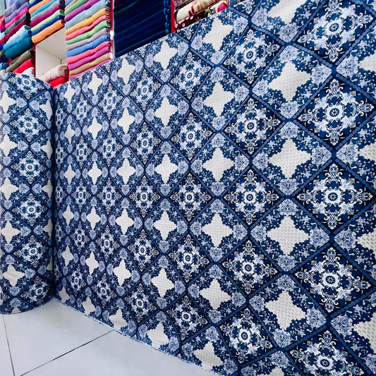 Premium blue printed bedsheet fabric roll for wholesale with elegant geometric floral design for custom bedding.