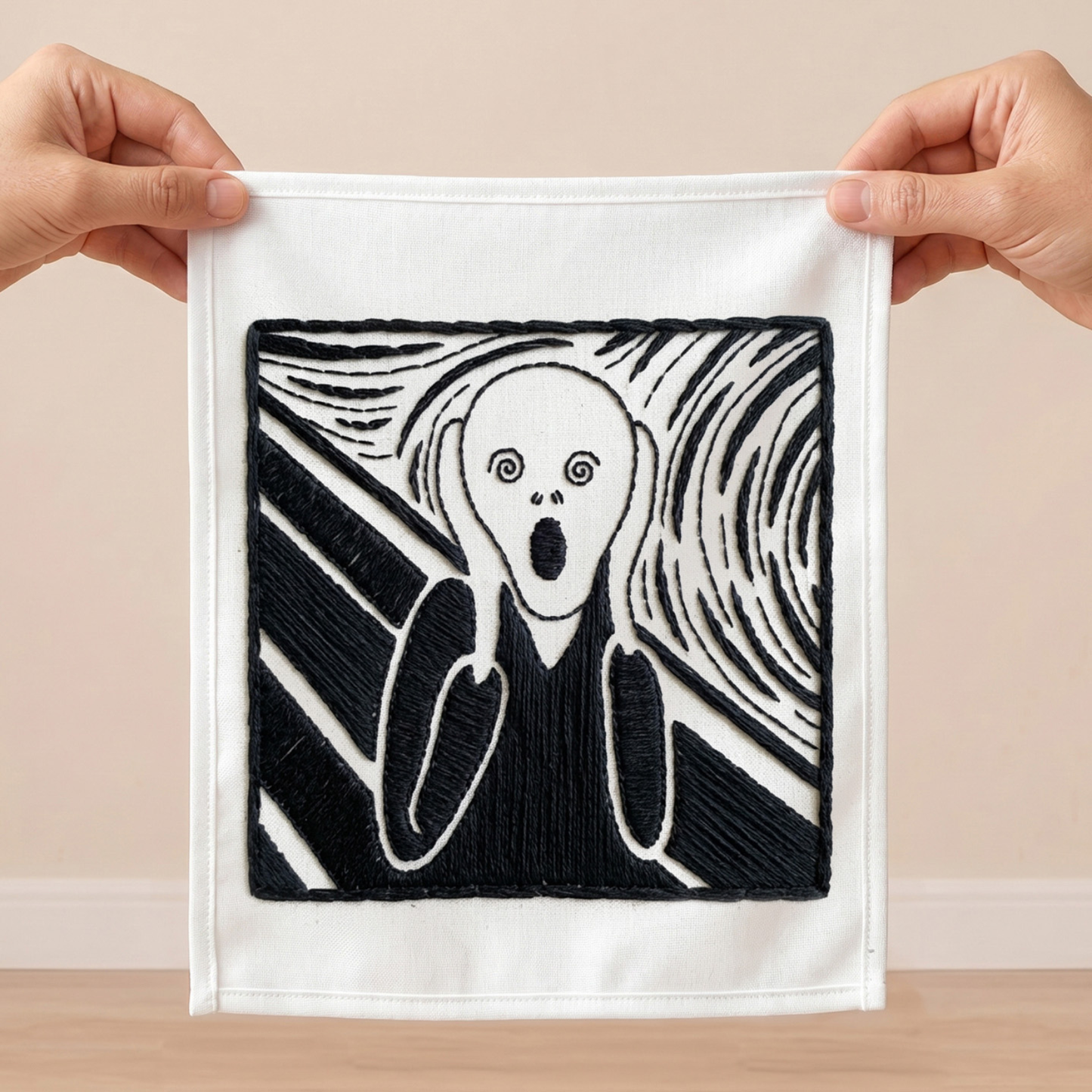 Contemporary textile wall decor featuring artistic embroidered expression design.