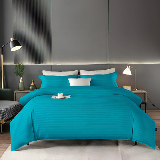 plain cyan mix cotton bedsheet set, neatly folded, showcasing its crisp hotel-quality style UAE.