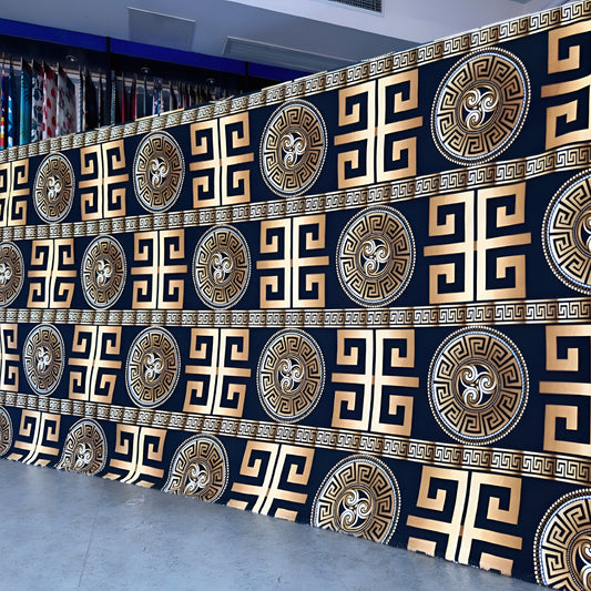 Black bedsheet with gold geometric pattern displayed in showroom — luxury solid-color bedding.