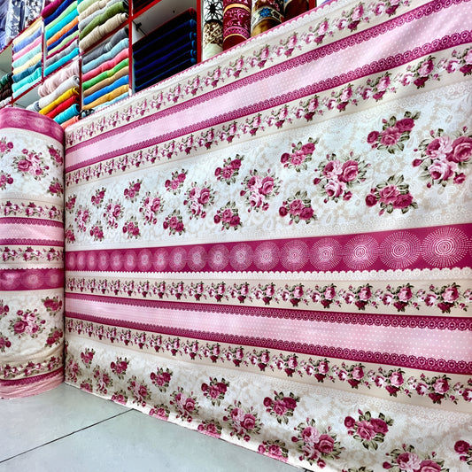 Pink floral bedsheet fabric roll wholesale display in UAE textile shop